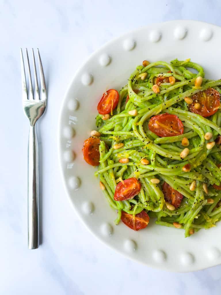 Avocado Pesto Pasta with Roasted Tomatoes and Pine Nuts. Vegan, GF & Healthy!