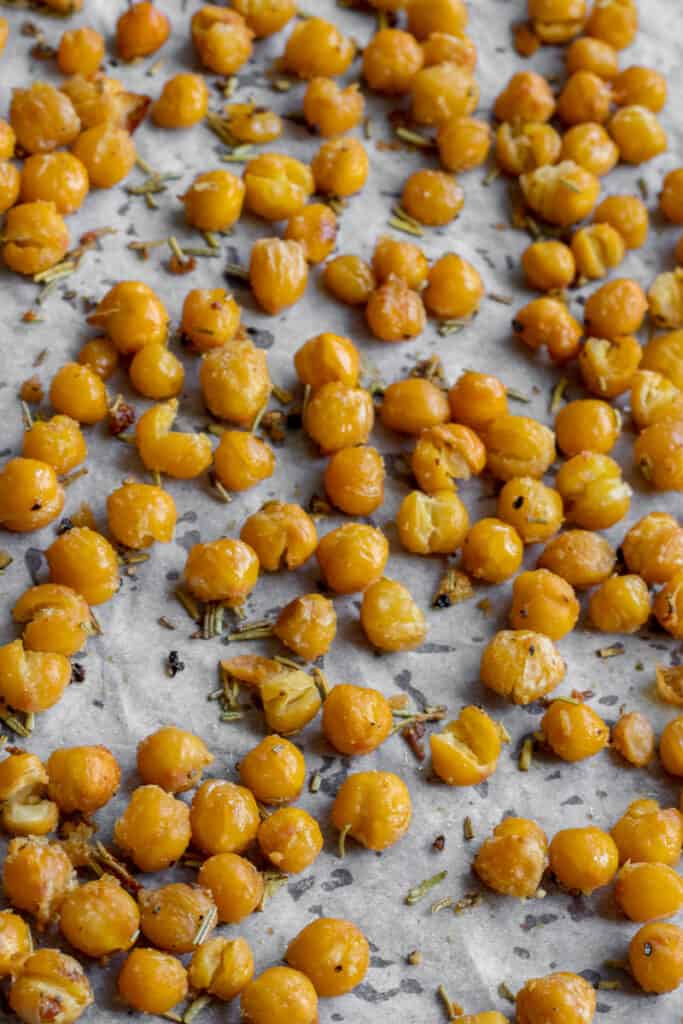 Crispy garlic & rosemary chickpea croutons on a baking tray.