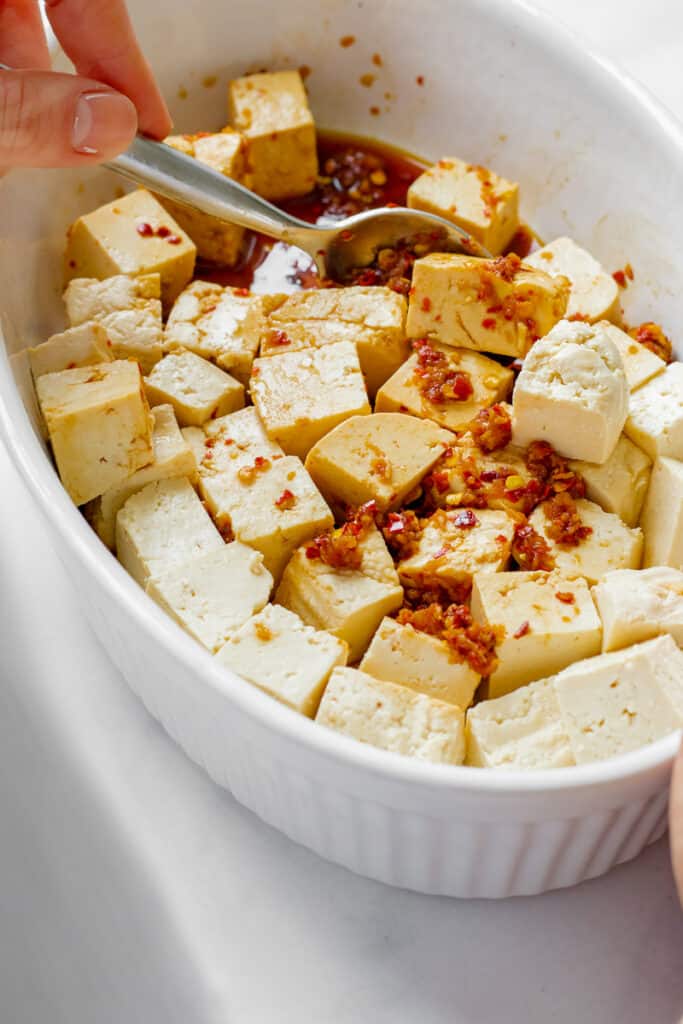 Tofu marinating in chilli-ginger sauce.