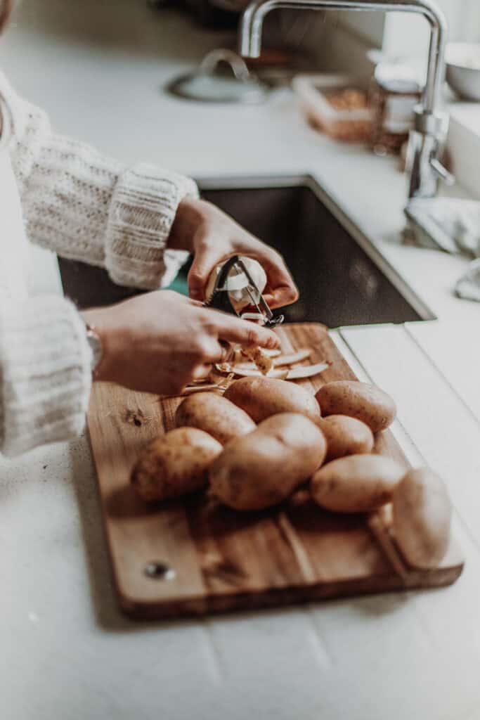 peeling potatoes
