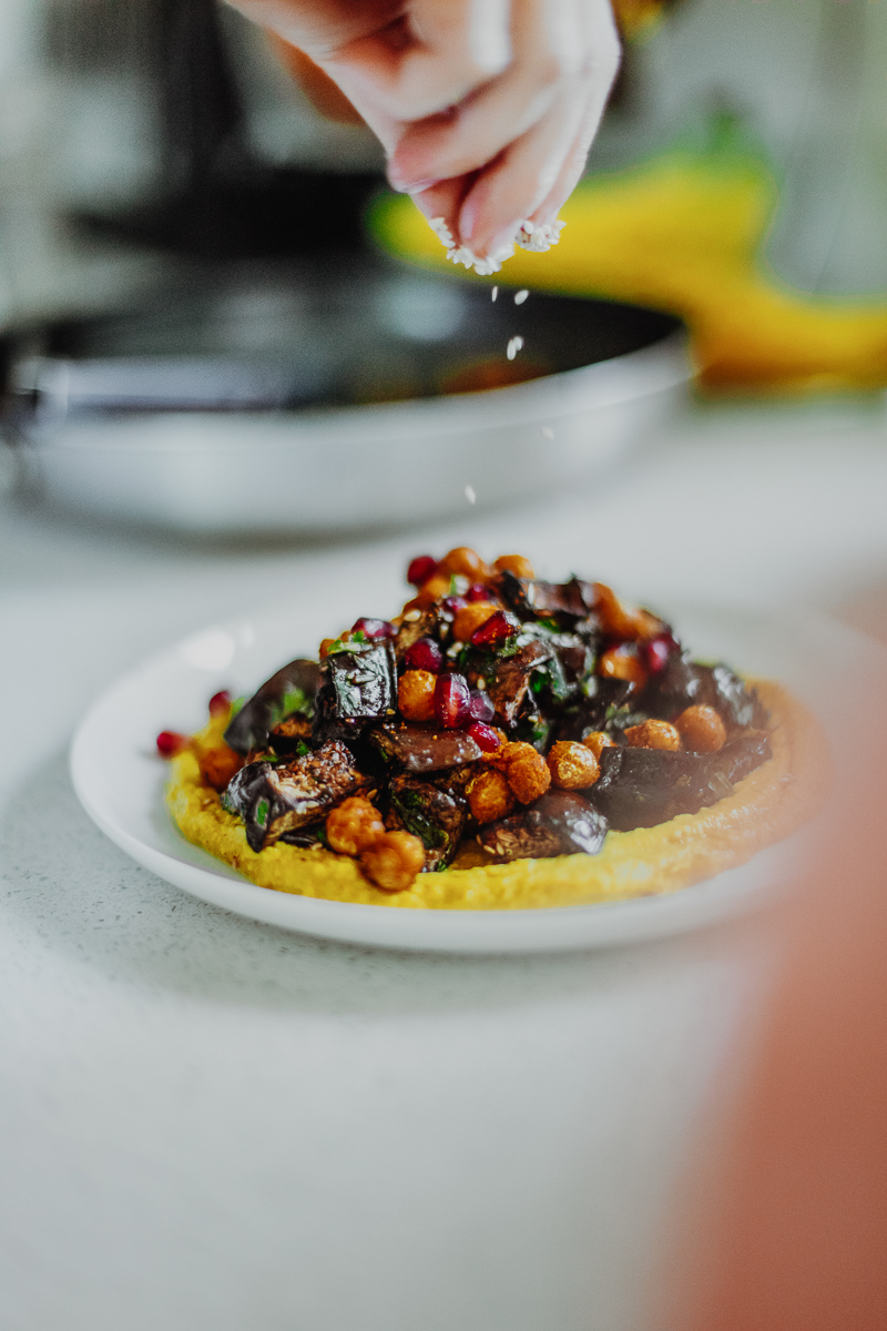 Putting the finishing touches on Loaded Lebanese Style Hummus - Healthy, GF & Vegan! Georgie Eats.