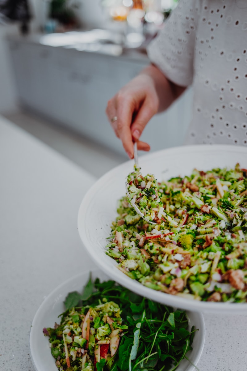 Serving the Raw Broccoli Salad - Vegan, GF & Healthy! Georgie Eats.