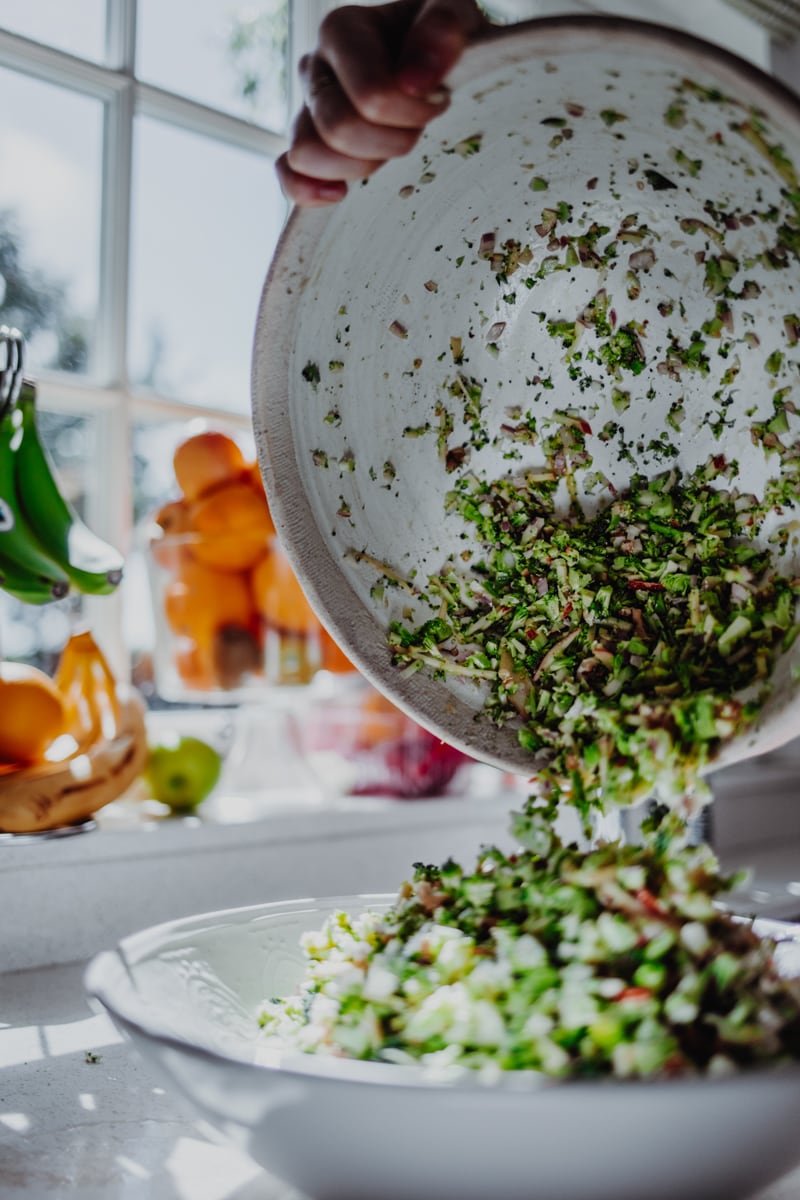transfering salad from mixing bowl to serving dish