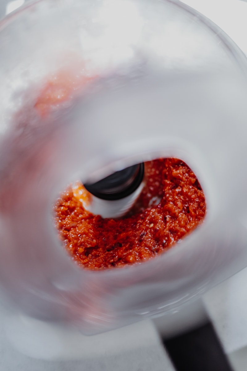 Blending the roasted red pepper & sundried tomato sauce