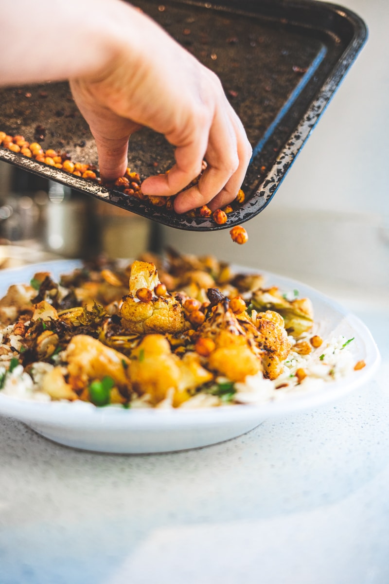 Plating up the Harissa Roasted Cauliflower Salad - Georgie Eats