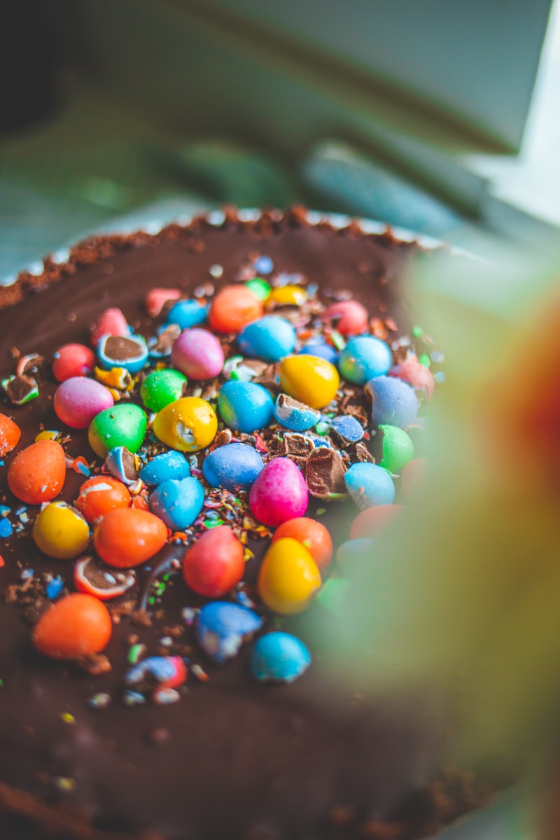 Close up of Vegan Mini Eggs on Easter Chocolate Tart