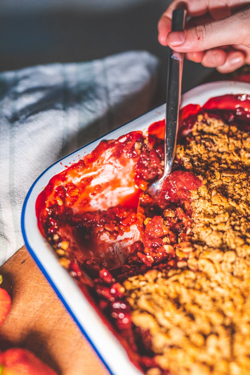 Strawberry & Vanilla Crumble being served - Georgie Eats
