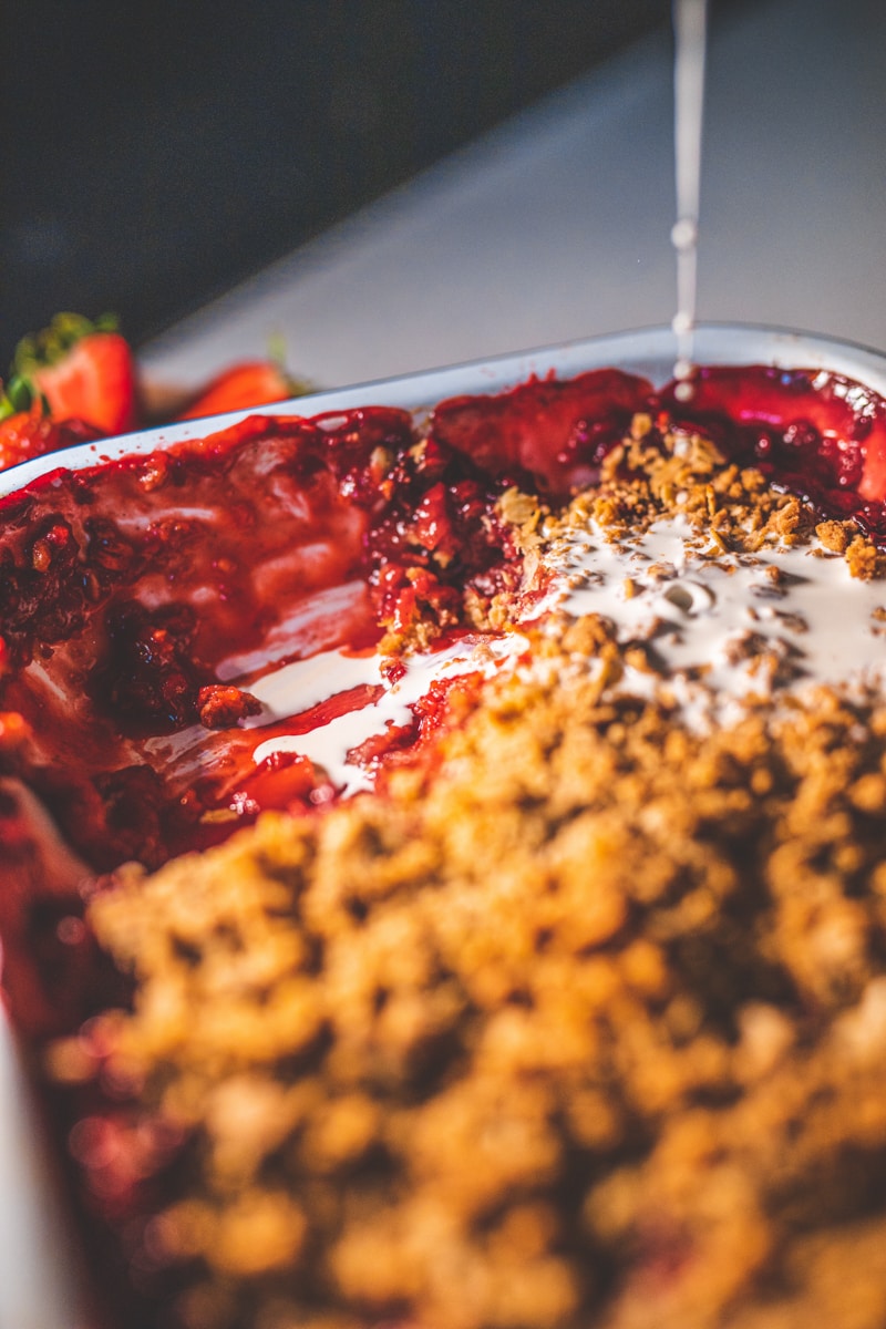 Strawberry & Vanilla Crumble with cream - Georgie Eats