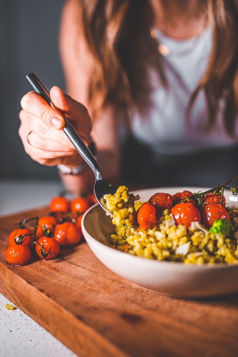 A forkful of Pesto Baked Risotto - Georgie Eats