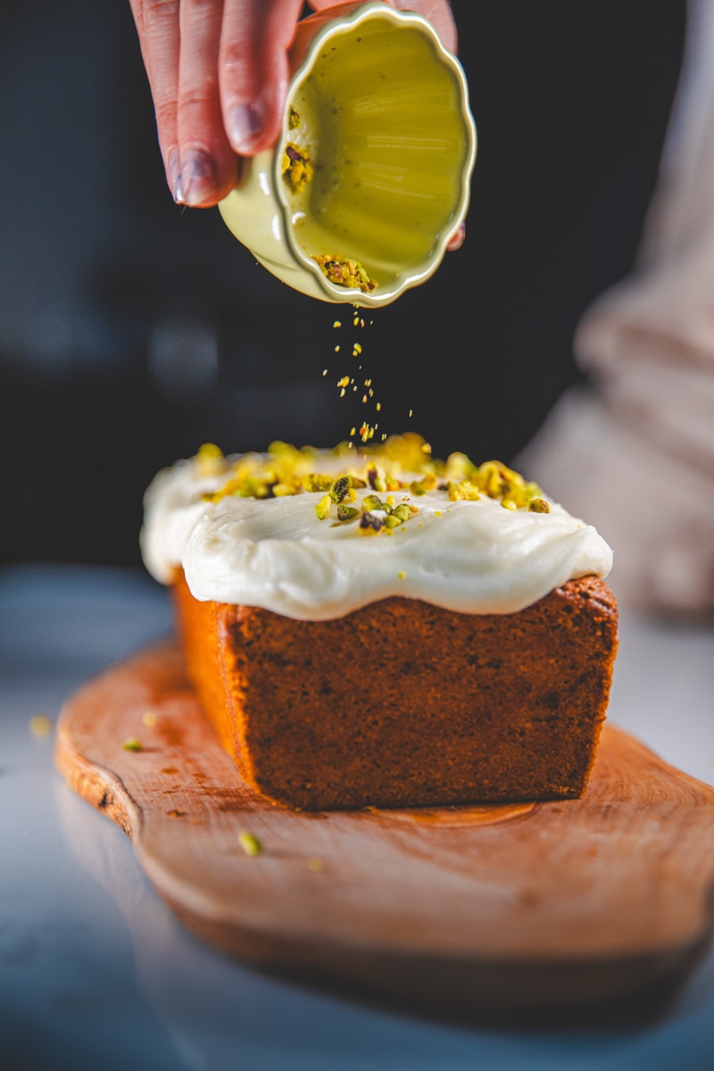 Decorating the Courgette & Pistachio Loaf - Georgie Eats