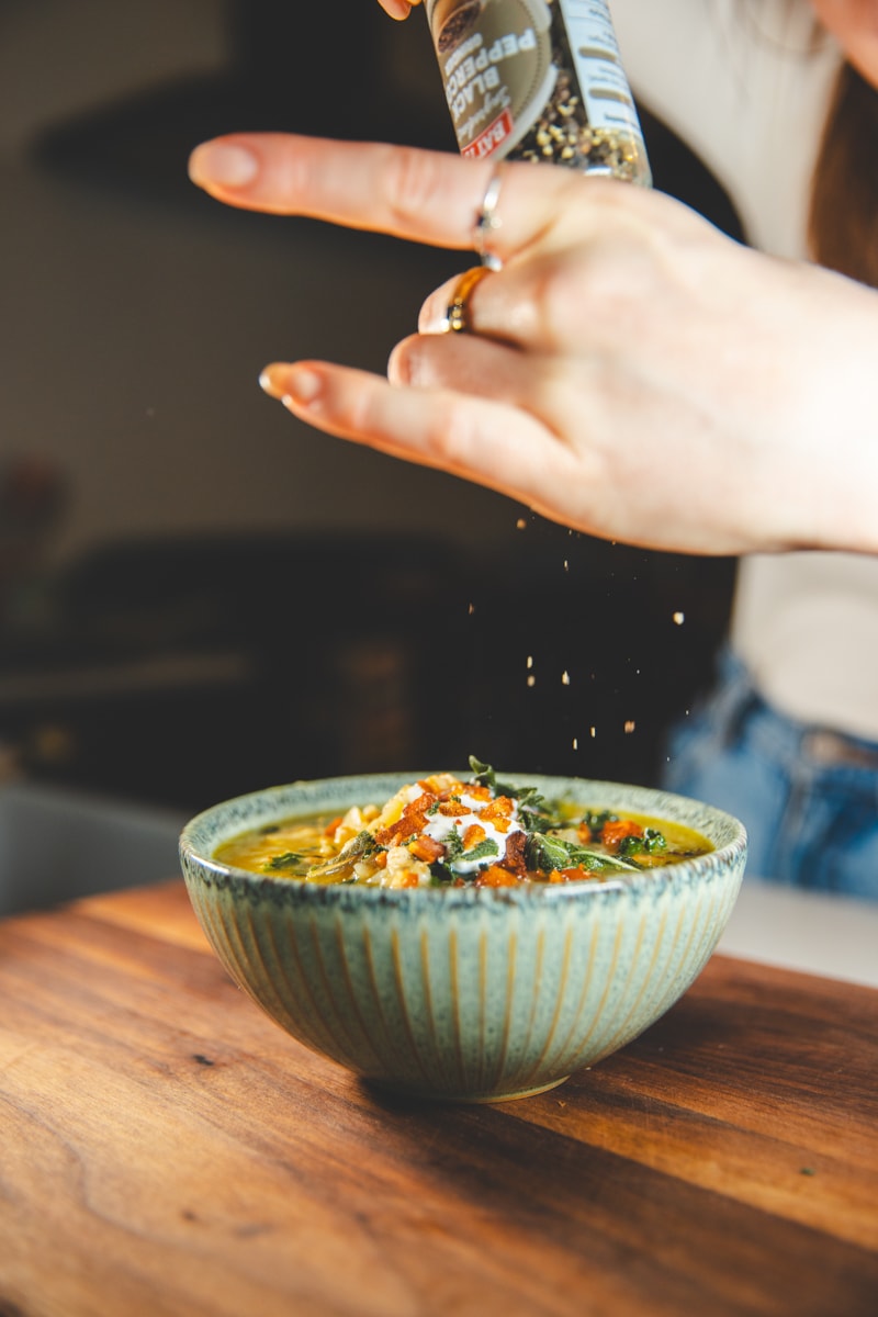 Serving the Celeriac, Spelt & Sage Soup - Georgie Eats