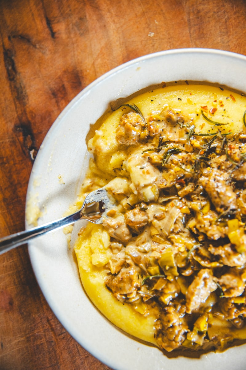 Eating the Sausage & Leek Ragu with Creamy Polenta - Georgie Eats