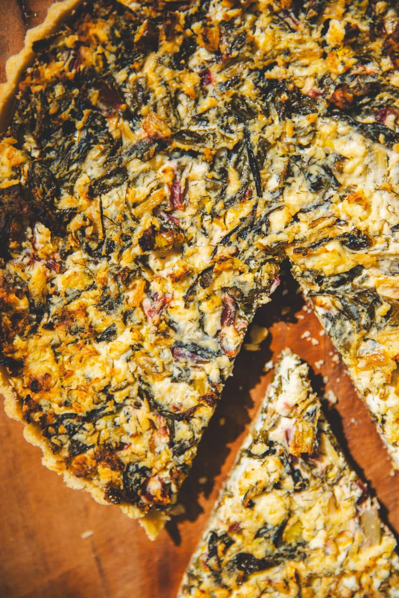 A slice of Swiss Chard Spanakopita Tart - Georgie Eats