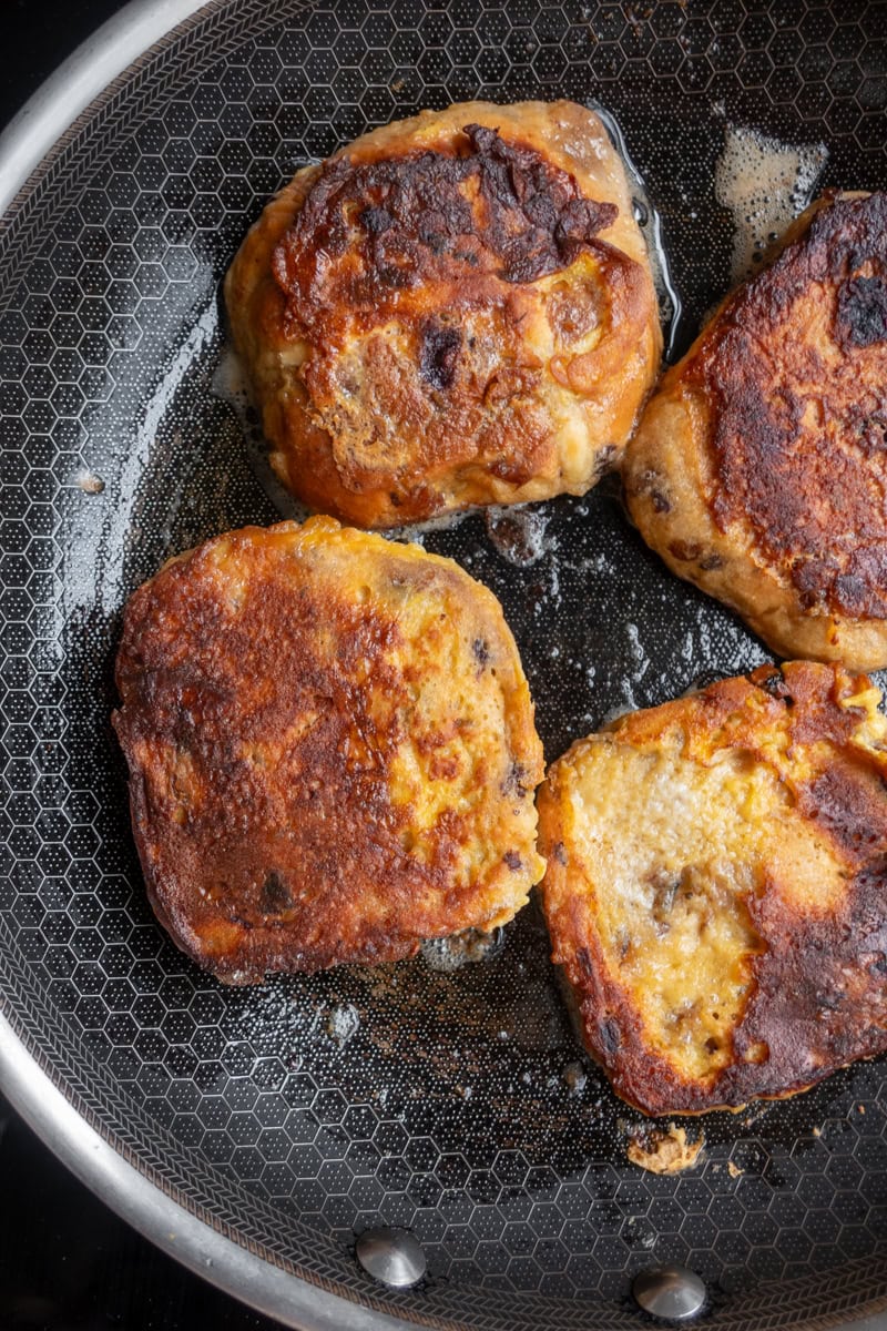 Hot Cross Bun French Toast frying in a pan - Georgie Mullen